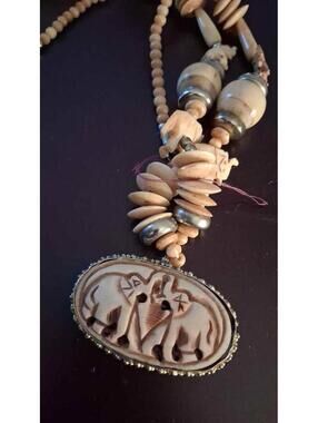 1980s carved bone and brass spacer figural elephant pendant ethnic tribal